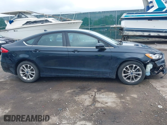 2020 Ford Fusion SE with VIN 3FA6P0HD7LR110180, listed as a IAAI auction lot 42180826 with 151,934 mi miles and . Bid and sale history available at DreamBid. Image 13.
