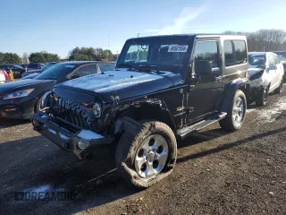 2014 Jeep Wrangler Sahara with VIN 1C4AJWBG9EL102983, listed as a Copart auction lot 84501554 with 120,372 mi miles and Salvage Title. Bid and sale history available at carsss.com. Image 1.