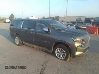 2023 Chevrolet Suburban Premier z VIN 1GNSKFKD8PR305863, wystawiony jako IAAI lot #37536455 z przebiegiem 13 765 mil mil oraz . Historia ofert i sprzedaży dostępna na DreamBid. Obrazek 1.