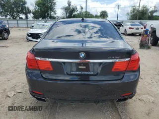 2011 BMW 7 Series with VIN WBAKX8C57BC198326, listed as a Copart auction lot 69985174 with 142,353 mi miles and Clean title. Bid and sale history available at DreamBid. Image 6.