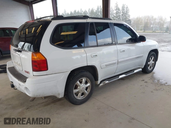 2003 GMC Envoy SLE with VIN 1GKDT13SX32319740, listed as a IAAI auction lot 41923578 with 210,811 mi miles. Bid and sale history available at carsss.com. Image 4.