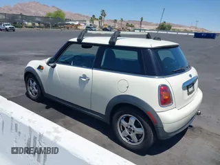 2010 MINI Hardtop with VIN WMWMF3C53ATZ25765, listed as a IAAI auction lot 42314587 with 107,677 mi miles and . Bid and sale history available at DreamBid. Image 3.