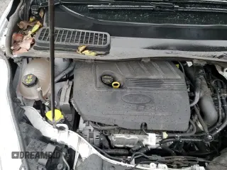 2018 Ford Escape SE z VIN 1FMCU9GD5JUC76985, wystawiony jako Copart lot #87299135 z przebiegiem 64 245 mil mil oraz Czysty tytuł • Clean title. Historia ofert i sprzedaży dostępna na DreamBid. Obrazek 14.