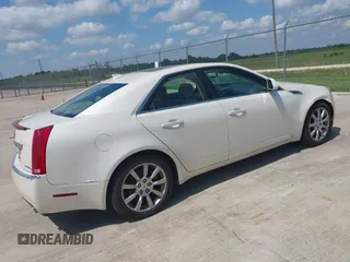 2009 Cadillac CTS AWD z VIN 1G6DS57V690103191, wystawiony jako IAAI lot #42418891 z przebiegiem 151 562 mil mil oraz . Historia ofert i sprzedaży dostępna na DreamBid. Obrazek 4.