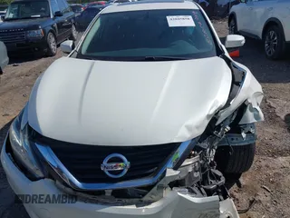 2017 Nissan Altima S with VIN 1N4AL3AP1HC220983, listed as a IAAI auction lot 42045858 with 114,753 mi miles and . Bid and sale history available at DreamBid. Image 11.