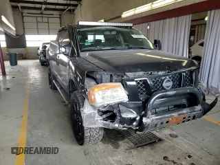 2011 Nissan Titan Pro-4X with VIN 1N6AA0EC5BN307980, listed as a Copart auction lot 42000295 with 168,335 mi miles and Salvage title. Bid and sale history available at DreamBid. Image 11.