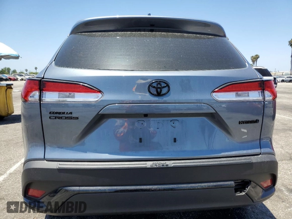 2024 Toyota Corolla Cross Hybrid S with VIN 7MUFBABG3RV043770, listed as a Copart auction lot 61007075 with 15,945 mi miles and Salvage title. Bid and sale history available at DreamBid. Image 6.