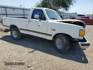 1991 Ford F-150 с VIN 1FTDF15N9MNA83835, выставлен на аукционе Copart как лот 56655785 с пробегом 70 731 миль миль и Списание • Salvage title. История ставок и продаж доступна на DreamBid. Изображение 4.