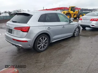 2023 Audi SQ5 Premium Plus z VIN WA1B4AFY9P2195394, wystawiony jako IAAI lot #41855818 z przebiegiem 25 946 mil mil oraz . Historia ofert i sprzedaży dostępna na DreamBid. Obrazek 4.
