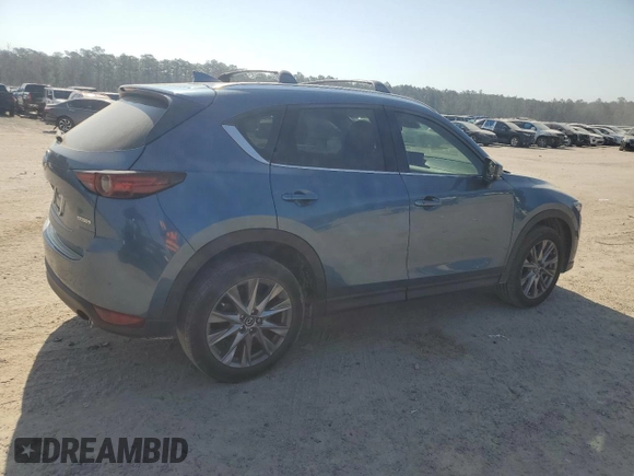 2021 Mazda CX-5 Grand Touring with VIN JM3KFADM0M0391349, listed as a Copart auction lot 48886685 with 38,923 mi miles and Clean Title. Bid and sale history available at carsss.com. Image 3.