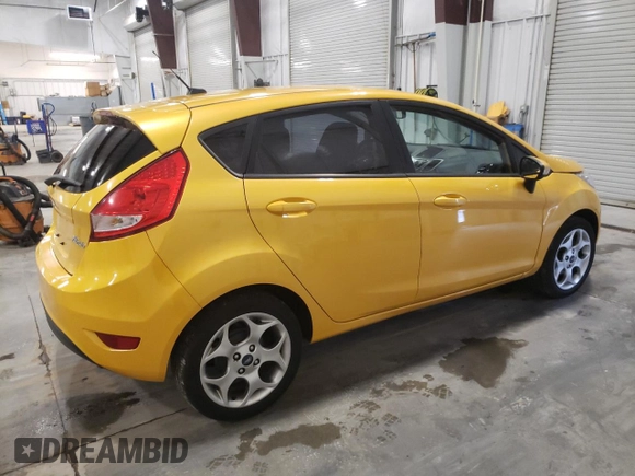 2011 Ford Fiesta SES with VIN 3FADP4FJ7BM114331, listed as a Copart auction lot 52442425 with 54,756 mi miles and Salvage Title. Bid and sale history available at carsss.com. Image 3.