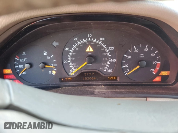 1999 Mercedes-Benz E-Class with VIN WDBJF65HXXA914389, listed as a Copart auction lot 72935884 with 192,084 mi miles and Salvage Title. Bid and sale history available at carsss.com. Image 9.