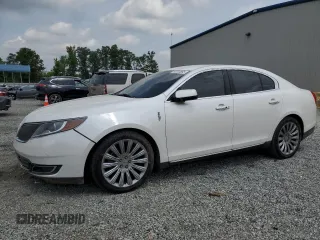 2013 Lincoln MKS with VIN 1LNHL9DK4DG612981, listed as a Copart auction lot 60701895 with 113,354 mi miles and Salvage title. Bid and sale history available at DreamBid. Image 1.