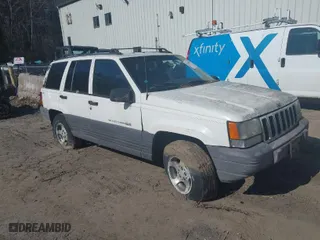 1996 Jeep Grand Cherokee Laredo with VIN 1J4GZ58Y7TC381600, listed as a IAAI auction lot 42065681 with 1 mi miles. Bid and sale history available at carsss.com. Image 1.