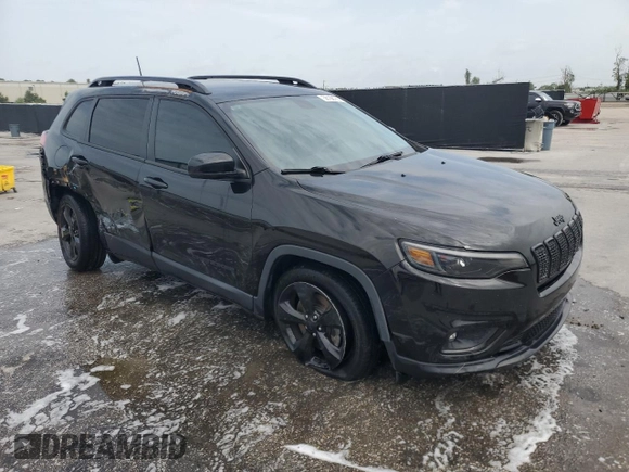 2020 Jeep Cherokee Altitude with VIN 1C4PJLLB4LD592817, listed as a Copart auction lot 58168785 with 57,400 mi miles and Salvage title. Bid and sale history available at DreamBid. Image 4.