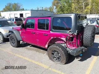 2024 Jeep Wrangler Sport S with VIN 1C4RJXN6XRW323881, listed as a IAAI auction lot 40543759 with 4,440 mi miles and . Bid and sale history available at DreamBid. Image 3.