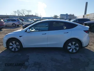 2023 Tesla Model Y Long Range z VIN 7SAYGDEE5PF765326, wystawiony jako IAAI lot #41757113 z przebiegiem 10 461 mil mil oraz . Historia ofert i sprzedaży dostępna na DreamBid. Obrazek 15.