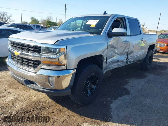 2018 Chevrolet Silverado 1500 LT with VIN 3GCPCREC9JG574686, listed as a IAAI auction lot 41676124 with 74,239 mi miles and . Bid and sale history available at DreamBid. Image 17.
