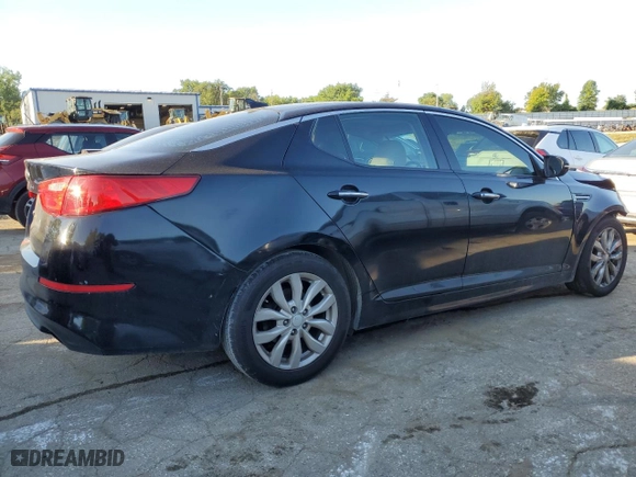 2015 Kia Optima EX with VIN 5XXGN4A79FG354934, listed as a Copart auction lot 61122404 with 153,676 mi miles and Salvage Title. Bid and sale history available at carsss.com. Image 3.