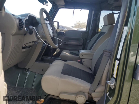 2008 Jeep Wrangler Unlimited X with VIN 1J4GB39108L608465, listed as a Copart auction lot 50949015 with 103,205 mi miles and Salvage Title. Bid and sale history available at DreamBid. Image 7.