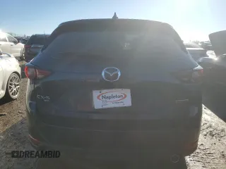 2021 Mazda CX-5 Grand Touring with VIN JM3KFBDM6M1499524, listed as a Copart auction lot 46604635 with 47,799 mi miles and Salvage Title. Bid and sale history available at carsss.com. Image 6.