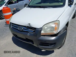 2006 Kia Sportage LX with VIN KNDJF723567151614, listed as a IAAI auction lot 42022102 with 128,564 mi miles and . Bid and sale history available at carsss.com. Image 6.