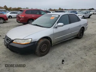 2001 Honda Accord LX z VIN 1HGCG16481A003685, wystawiony jako Copart lot #80932074 z przebiegiem Nie podano mil oraz Szkoda całkowita • Salvage title. Historia ofert i sprzedaży dostępna na DreamBid. Obrazek 1.