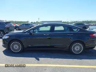 2016 Ford Fusion Titanium with VIN 3FA6P0K9XGR158234, listed as a IAAI auction lot 42043716 with 161,164 mi miles. Bid and sale history available at carsss.com. Image 14.