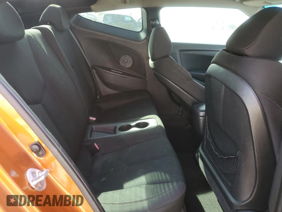 2013 Hyundai Veloster w/Gray Int z VIN KMHTC6AD1DU103219, wystawiony jako Copart lot #60426875 z przebiegiem 135 869 mil mil oraz Szkoda całkowita • Salvage title. Historia ofert i sprzedaży dostępna na DreamBid. Obrazek 10.