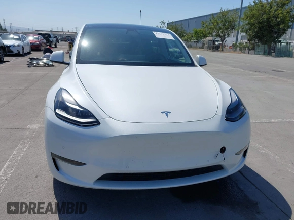 2022 Tesla Model Y Performance z VIN 7SAYGDEF2NF347456, wystawiony jako IAAI lot #42177725 z przebiegiem 29 374 mil mil oraz . Historia ofert i sprzedaży dostępna na DreamBid. Obrazek 13.