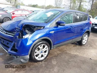 2013 Ford Escape SEL with VIN 1FMCU0HX1DUD56454, listed as a IAAI auction lot 41994352 with 105,974 mi miles. Bid and sale history available at carsss.com. Image 2.