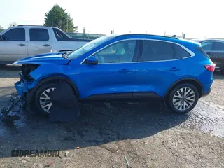 2020 Ford Escape Titanium Hybrid with VIN 1FMCU9DZ1LUB59214, listed as a IAAI auction lot 42050336 with 59,547 mi miles and . Bid and sale history available at DreamBid. Image 14.