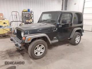2006 Jeep Wrangler Sport Right Hand Drive with VIN 1J4F449S56P741328, listed as a IAAI auction lot 41476847 with 67,203 mi miles. Bid and sale history available at carsss.com. Image 2.