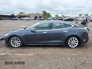 2016 Tesla Model S 90D with VIN 5YJSA1E27GF129824, listed as a IAAI auction lot 42058080 with 113,171 mi miles and . Bid and sale history available at DreamBid. Image 15.
