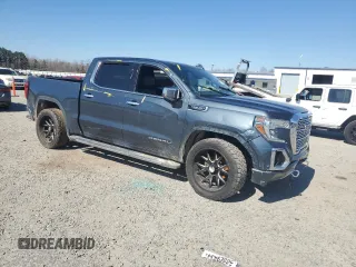 2019 GMC Sierra 1500 Denali with VIN 3GTU9FEDXKG277906, listed as a Copart auction lot 47025625 with 138,008 mi miles and Salvage title. Bid and sale history available at DreamBid. Image 4.
