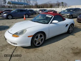 1999 Porsche Boxster z VIN WP0CA2986XU628985, wystawiony jako Copart lot #44360935 z przebiegiem 115 707 mil mil oraz Szkoda całkowita • Salvage title. Historia ofert i sprzedaży dostępna na DreamBid. Obrazek 1.