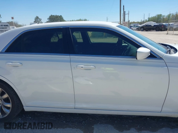 2016 Chrysler 300 Anniversary Edition with VIN 2C3CCAAG7GH313739, listed as a IAAI auction lot 41833824 with 285,806 mi miles and . Bid and sale history available at DreamBid. Image 14.