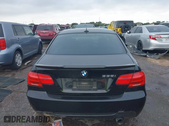 2012 BMW 3 Series 335i with VIN WBAKG7C5XCE802399, listed as a IAAI auction lot 42210396 with 141,502 mi miles and . Bid and sale history available at DreamBid. Image 16.