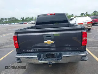 2014 Chevrolet Silverado 1500 LT with VIN 1GCRCREC5EZ161985, listed as a IAAI auction lot 42096479 with 225,412 mi miles and . Bid and sale history available at DreamBid. Image 17.