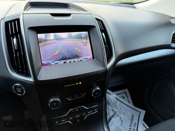 2020 Ford Edge SE с VIN 2FMPK3G9XLBB11099, выставлен на аукционе Copart как лот 66417805 с пробегом 119 223 миль миль и Чистый • Clean title. История ставок и продаж доступна на DreamBid. Изображение 12.