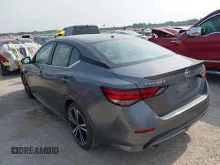 2021 Nissan Sentra SR z VIN 3N1AB8DV6MY219756, wystawiony jako IAAI lot #42257180 z przebiegiem 55 867 mil mil oraz . Historia ofert i sprzedaży dostępna na DreamBid. Obrazek 3.