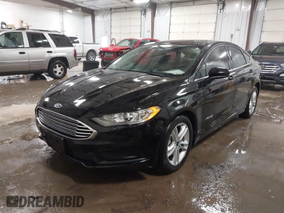 2018 Ford Fusion SE z VIN 3FA6P0LU3JR203864, wystawiony jako IAAI lot #41476335 z przebiegiem 49 246 mil mil oraz . Historia ofert i sprzedaży dostępna na DreamBid. Obrazek 2.