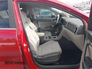 2018 Kia Sportage LX with VIN KNDPM3ACXJ7461874, listed as a IAAI auction lot 42064801 with 123,809 mi miles and . Bid and sale history available at carsss.com. Image 5.