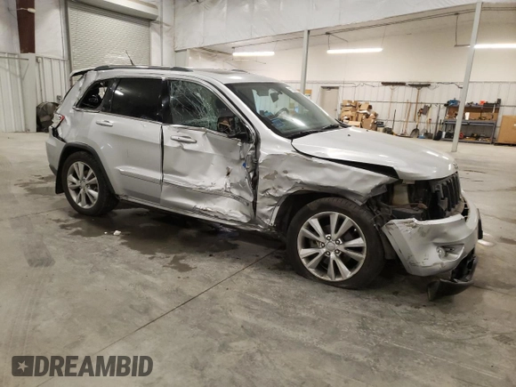 2011 Jeep Grand Cherokee 70th Anniversary with VIN 1J4RR4GG0BC666357, listed as a Copart auction lot 71726674 with 122,802 mi miles and Salvage Title. Bid and sale history available at carsss.com. Image 4.