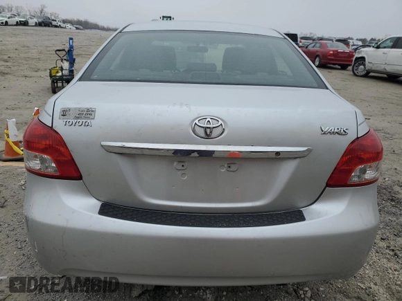 2012 Toyota Yaris with VIN JTDBT4K35CL037319, listed as a Copart auction lot 46098585 with 126,039 mi miles and Salvage Title. Bid and sale history available at DreamBid. Image 6.