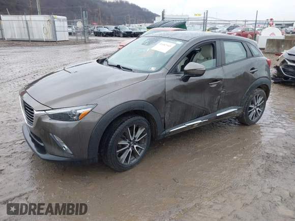 2016 Mazda CX-3 Grand Touring with VIN JM1DKBD77G0107328, listed as a IAAI auction lot 41682949 with 156,935 mi miles. Bid and sale history available at carsss.com. Image 17.