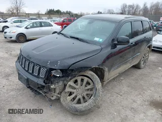 2019 Jeep Grand Cherokee Laredo E with VIN 1C4RJFAGXKC674676, listed as a IAAI auction lot 41942125 with 72,151 mi miles. Bid and sale history available at carsss.com. Image 6.