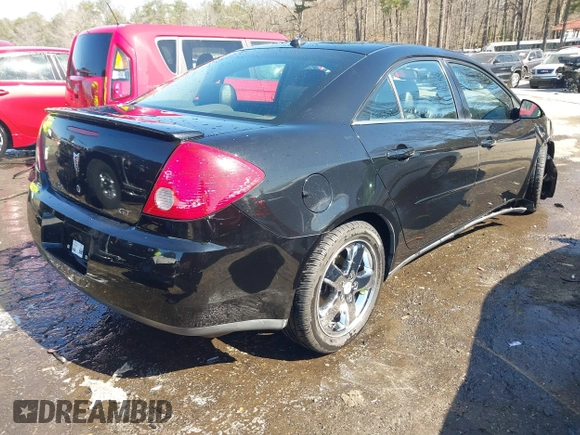 2005 Pontiac G6 GT with VIN 1G2ZH548154165427, listed as a IAAI auction lot 41650622 with 149,187 mi miles. Bid and sale history available at carsss.com. Image 4.