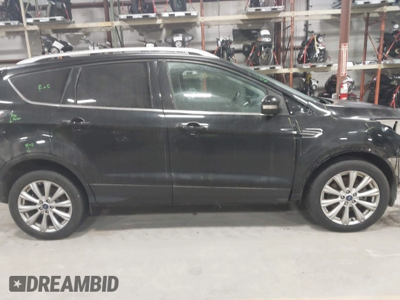 2017 Ford Escape Titanium with VIN 1FMCU9J9XHUB51401, listed as a IAAI auction lot 41025642 with 77,908 mi miles. Bid and sale history available at carsss.com. Image 13.