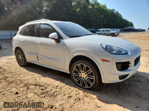 2015 Porsche Cayenne S with VIN WP1AB2A24FLA59813, listed as a Copart auction lot 60604305 with 137,719 mi miles and Salvage title. Bid and sale history available at DreamBid. Image 4.
